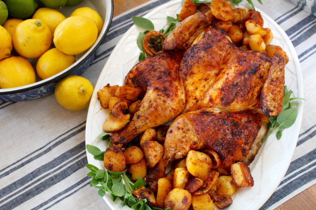 Spatchcocked Piment d’Ville Chicken with Charred Lemons and Potatoes