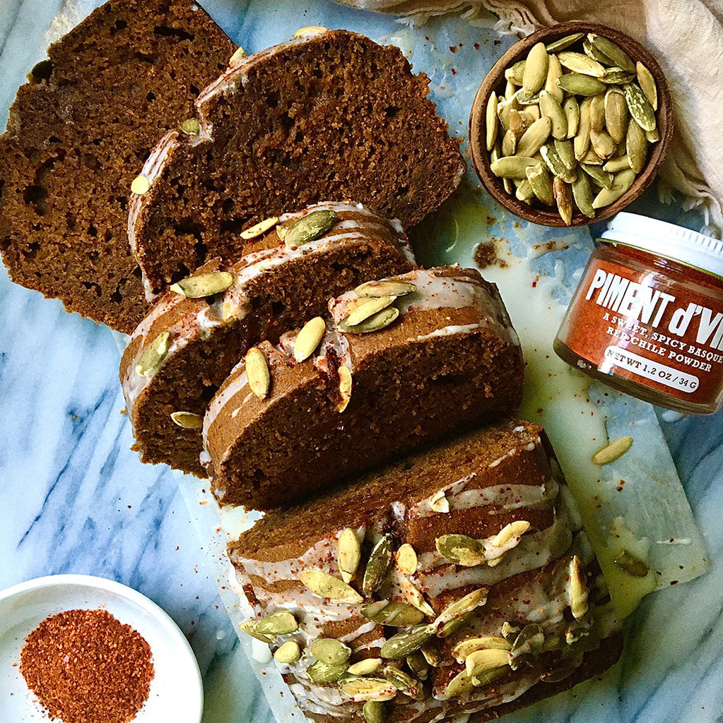 plate with sliced pumpkin gingerbread loaf cake