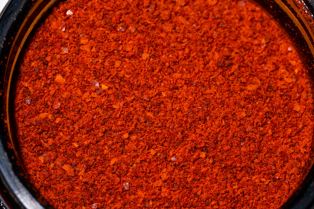 close up of fine texture of guajillo chile powder